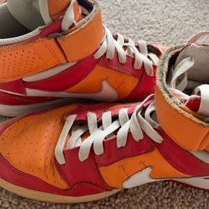 Red and Orange Nike 6.0